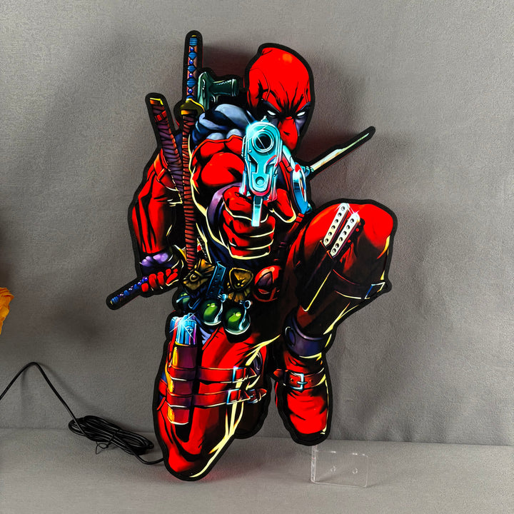 La boîte à lumière LED personnalisée Deadpool Design illumine votre espace avec génialité