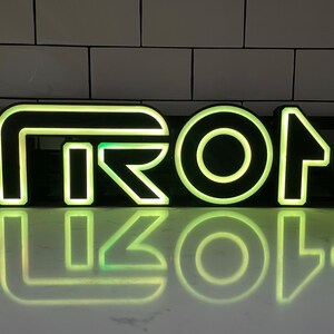 TRON Legacy style 3D Printed RGB LED illuminated wall sign