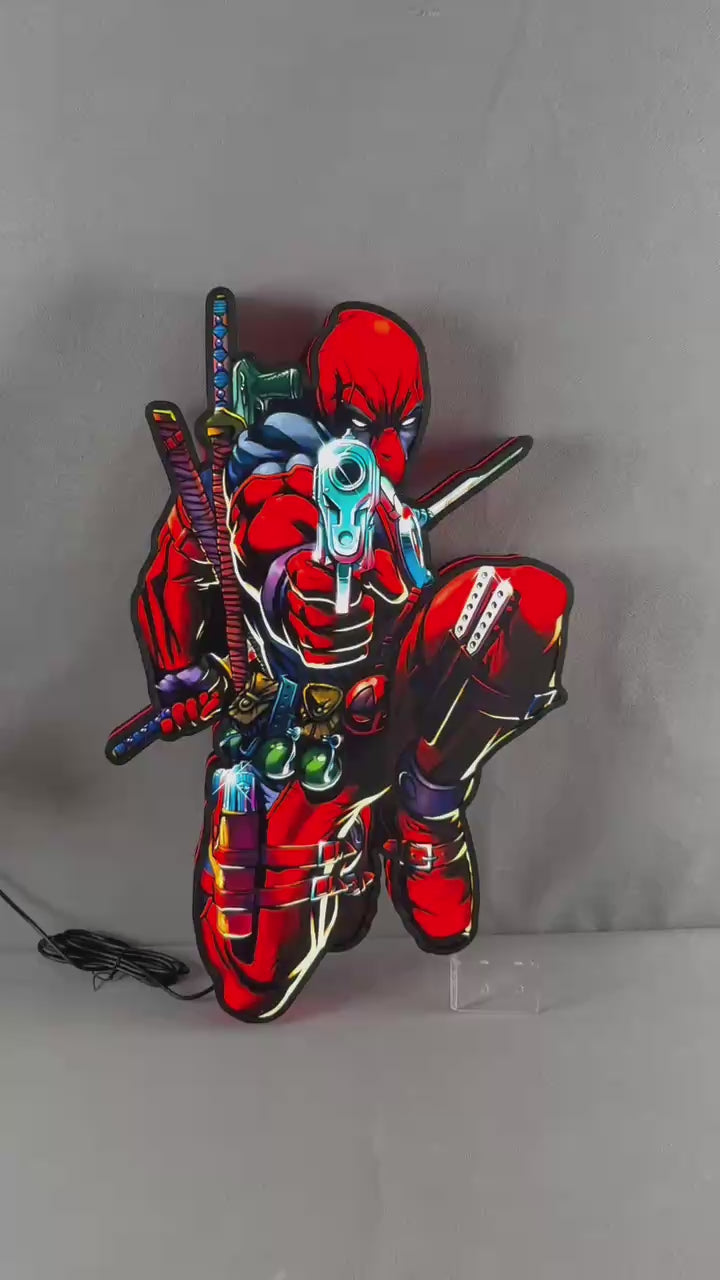 La boîte à lumière LED personnalisée Deadpool Design illumine votre espace avec génialité